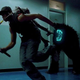 John Boyega runs from aliens with a sword in hand in 2011's Attack the Block.